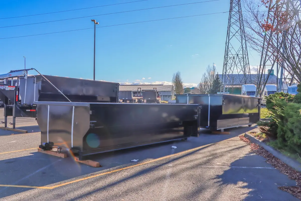 Roll-off dumpster ready for waste disposal at job site for Construction Dumpster Rental in Rock Island